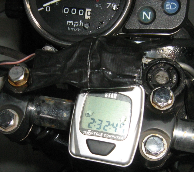 a digital bicycle speedometer on the handlebars of my clr 125